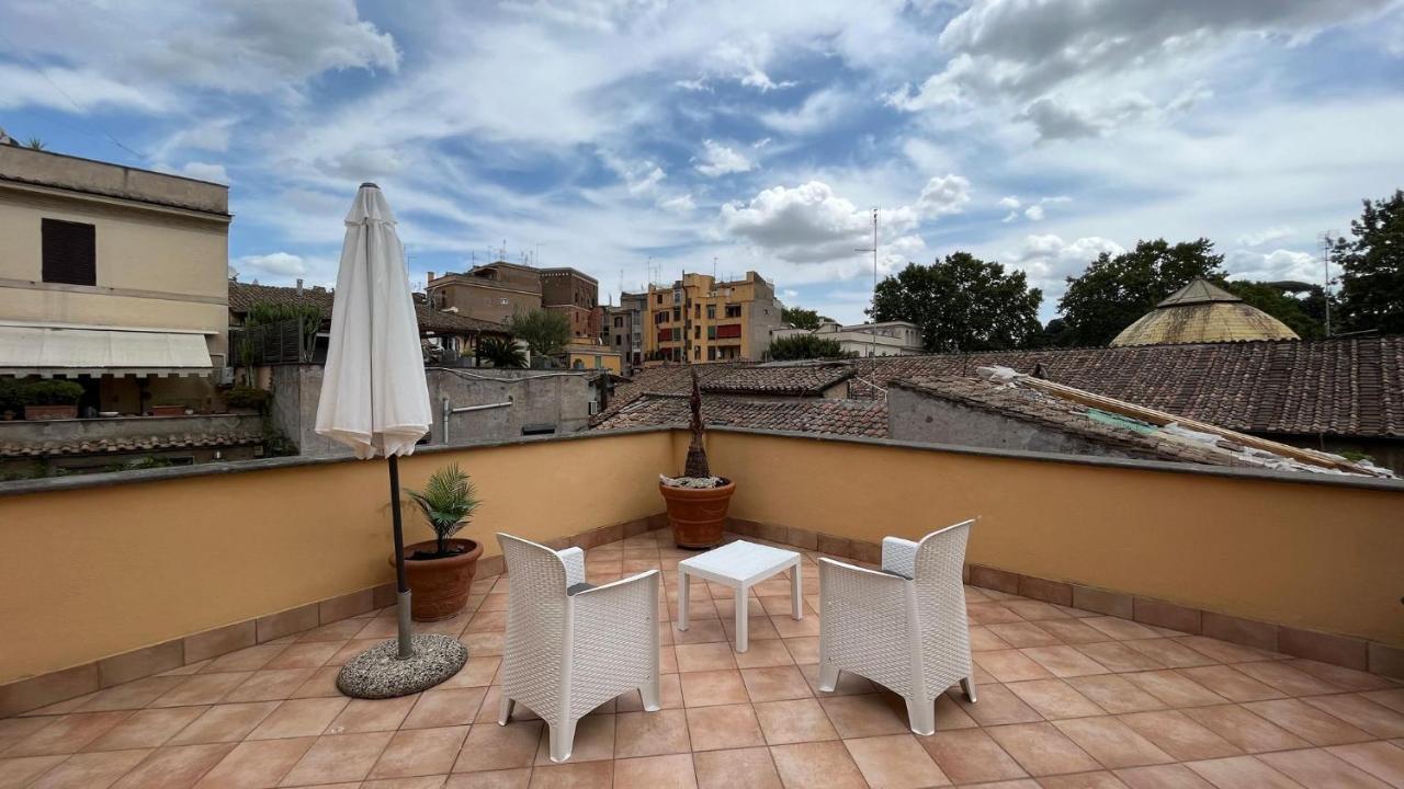 Attico Con Terrazza Santa Cecilia Apartment Rome Bagian luar foto